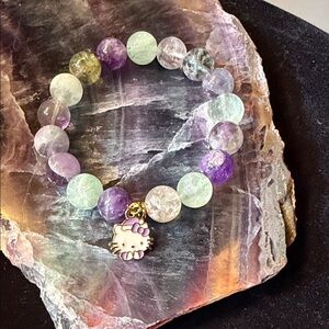 Purple and Green Beaded Bracelet with Charm